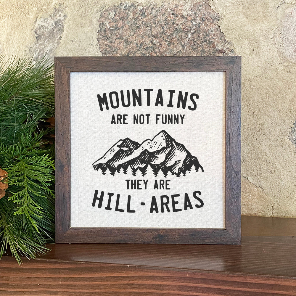 Mountains are not Funny - Framed Sign